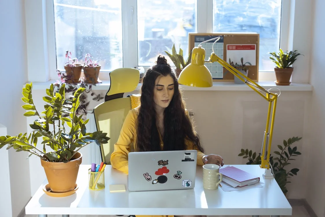 A girl working on her laptop